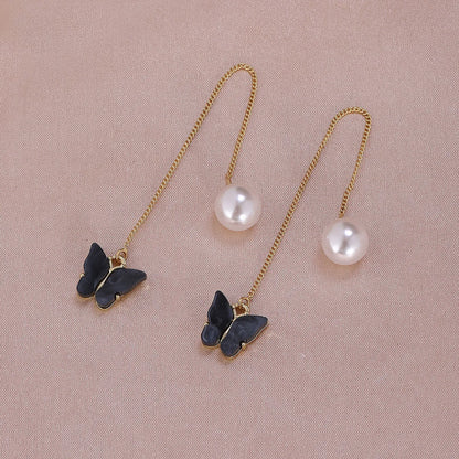 1 Pair Simple Style Moon Alloy Plating Inlay Artificial Pearls Rhinestones Women'S Drop Earrings