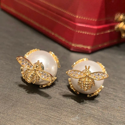 1 Pair Simple Style Shiny Bee Hollow Out Inlay Sequin Brass Artificial Pearls Zircon Gold Plated Ear Studs