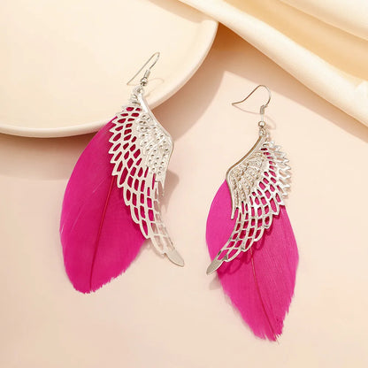 1 Pair Simple Style Wings Alloy Hollow Out Women'S Earrings