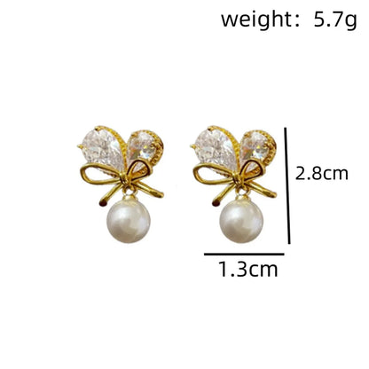 1 Pair Sweet Korean Style Heart Shape Bow Knot Inlay Alloy Artificial Pearls Gold Plated Drop Earrings