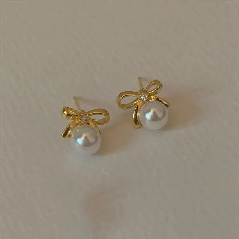 1 Pair Sweet Simple Style Bow Knot Inlay Sterling Silver Pearl Zircon Ear Studs