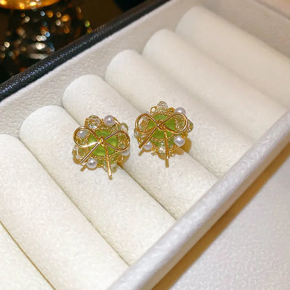 1 Pair Sweet Simple Style Bow Knot Plating Inlay Copper Imitation Pearl Crystal Glass 14K Gold Plated Ear Studs