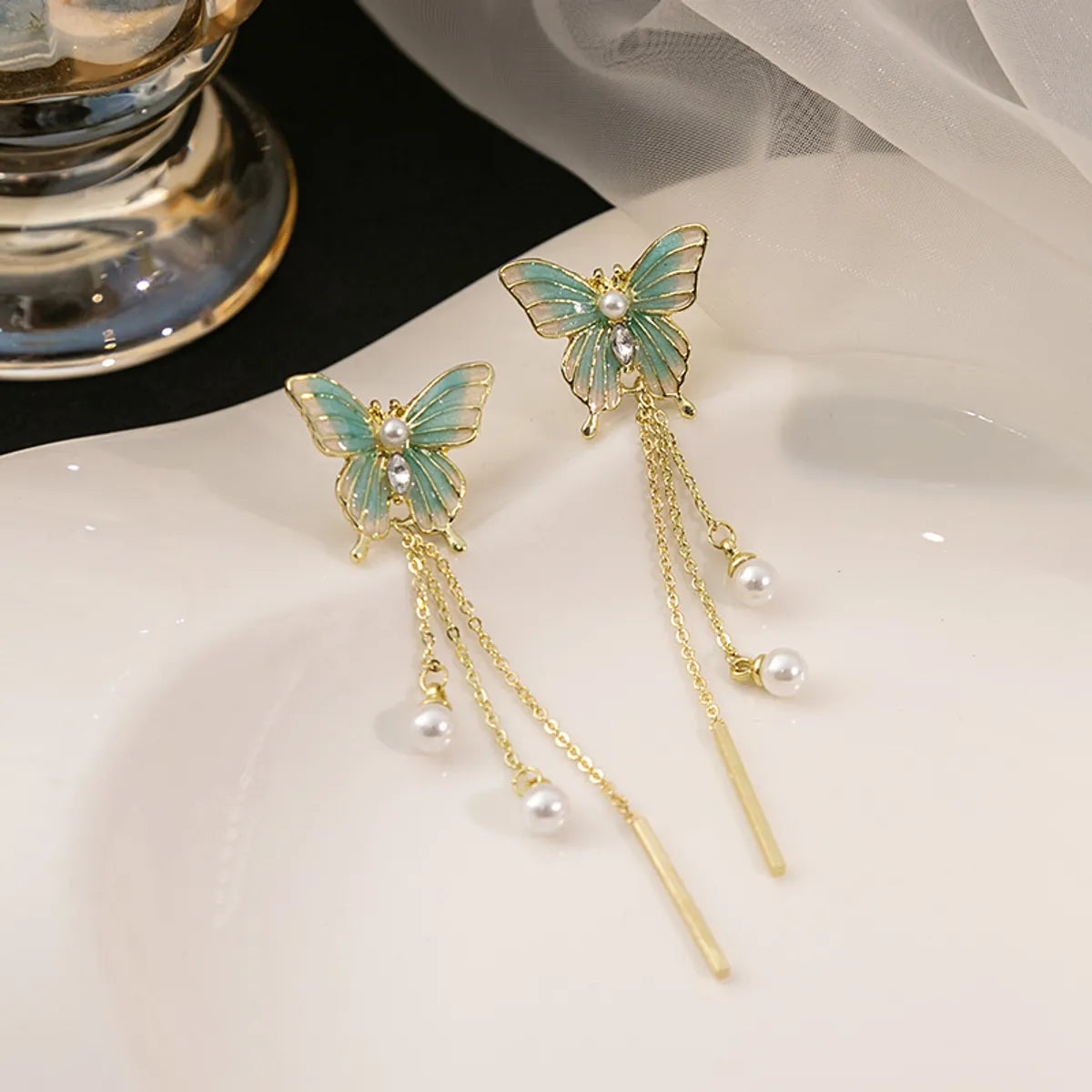 1 Pair Sweet Simple Style Butterfly Tassel Pearl Alloy Drop Earrings