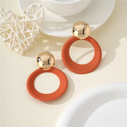 1 Pair Sweet Simple Style Round Spray Paint Hollow Out Alloy Drop Earrings