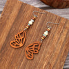 1 Pair Vintage Style Ethnic Style Leaves Butterfly Hollow Out Wood Drop Earrings