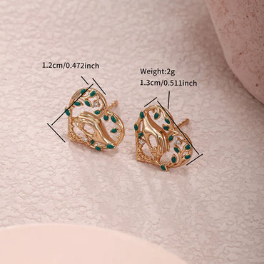 1 Pair XUPING Artistic Heart Shape Enamel Hollow Out Copper Alloy Artificial Gemstones 18K Gold Plated Ear Studs