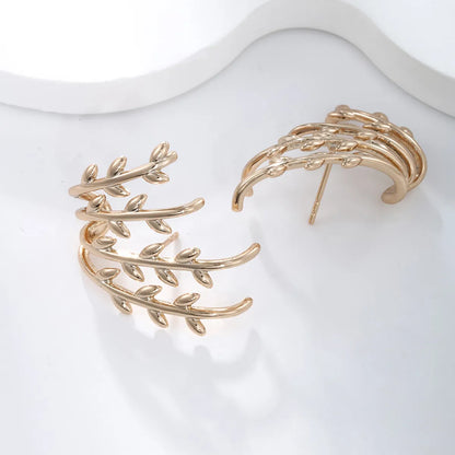 1 Pair Xuping Simple Style Irregular Leaf Asymmetrical Plating Copper Alloy 18k Gold Plated Ear Studs