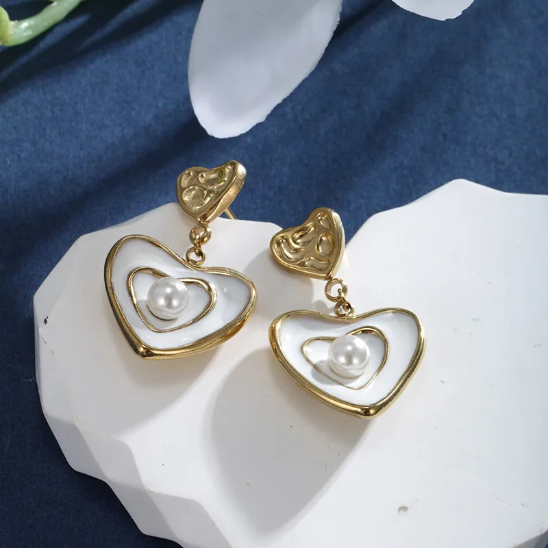 1 Pair XUPING Sweet Dolphin Heart Shape Pearl Enamel Inlay 304 Stainless Steel Artificial Gemstones Beads 18K Gold Plated Drop Earrings