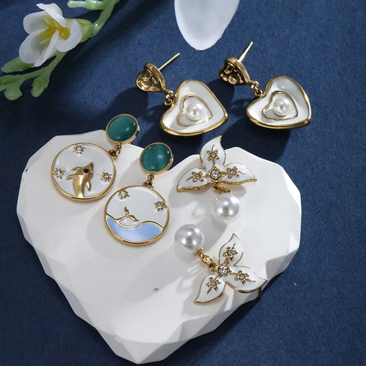 1 Pair XUPING Sweet Dolphin Heart Shape Pearl Enamel Inlay 304 Stainless Steel Artificial Gemstones Beads 18K Gold Plated Drop Earrings