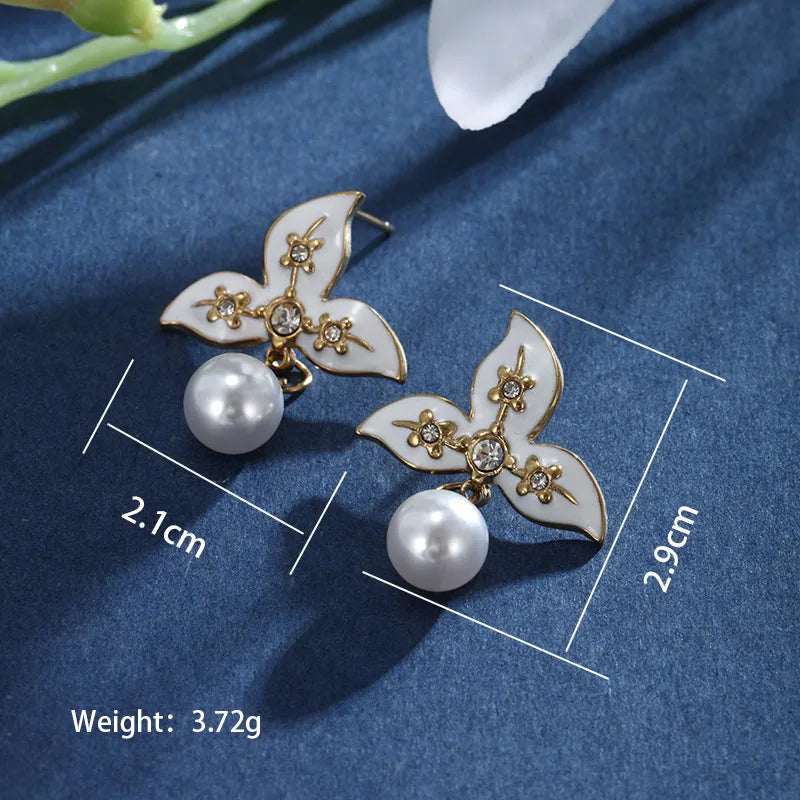 1 Pair XUPING Sweet Dolphin Heart Shape Pearl Enamel Inlay 304 Stainless Steel Artificial Gemstones Beads 18K Gold Plated Drop Earrings