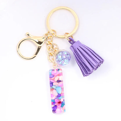 1 Piece Artistic Letter Alloy Plastic Resin Couple Bag Pendant Keychain