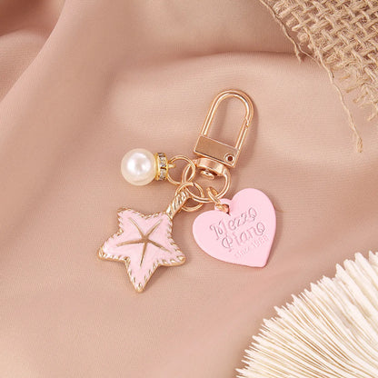 1 Piece Cartoon Style Letter Heart Shape Metal Inlay Artificial Pearls Rhinestones Women'S Keychain