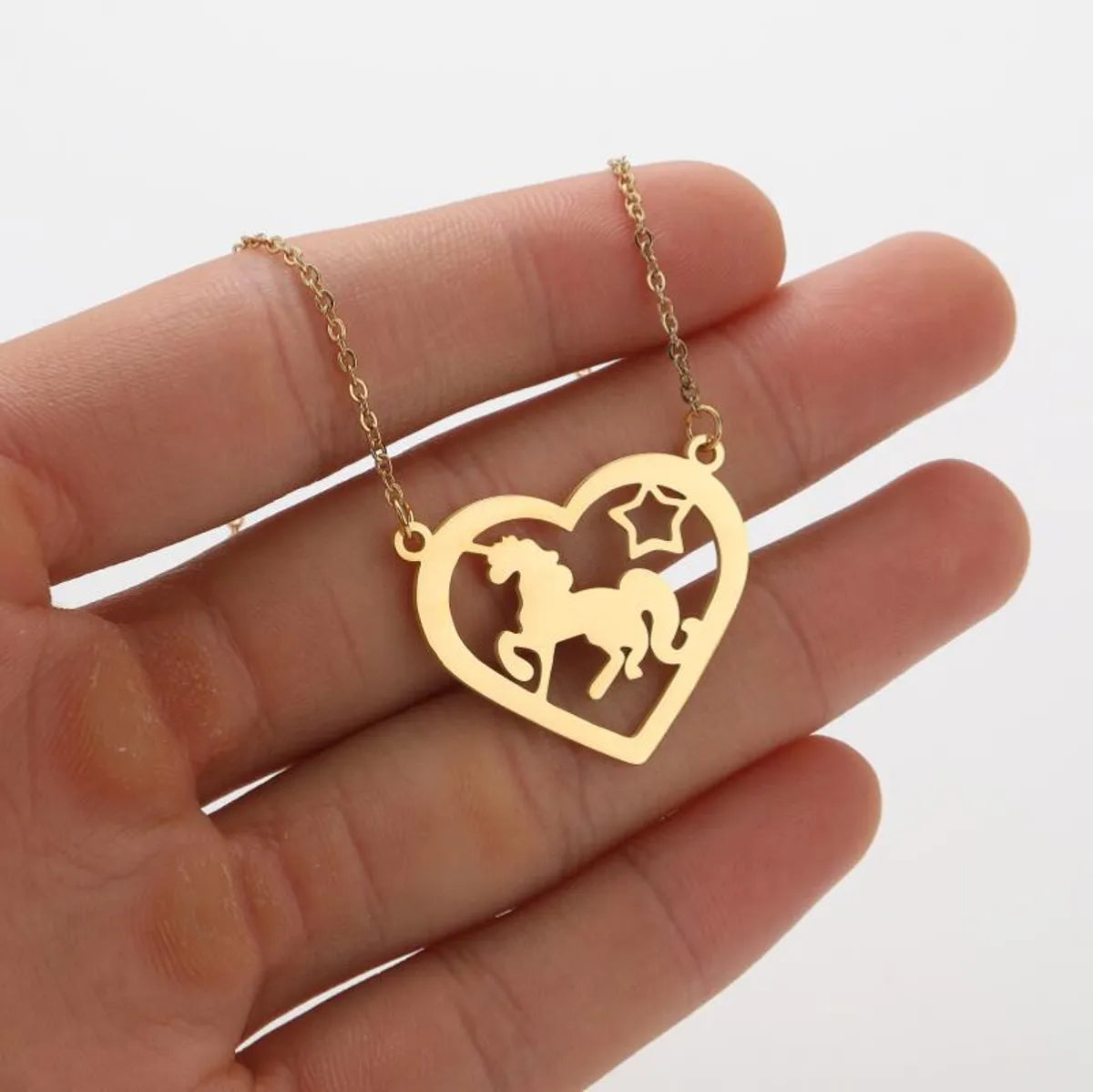 Stainless Steel Titanium Steel Simple Style Hollow Out Animal Pendant Necklace