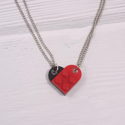 1 Piece Simple Style Heart Shape Alloy Plastic Patchwork Couple Pendant Necklace