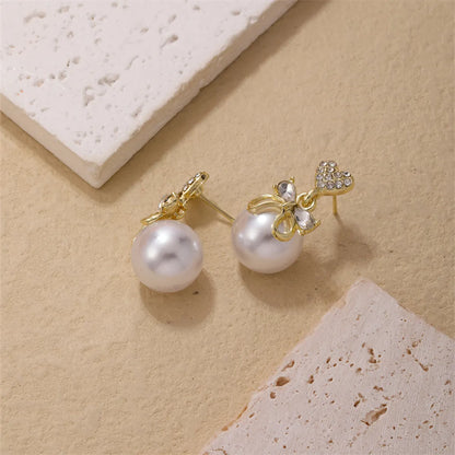 1 Piece Simple Style Heart Shape Bow Knot Plating Inlay Copper Pearl Zircon Gold Plated Ear Studs