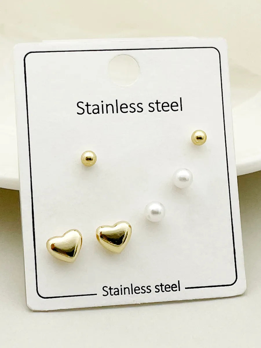 1 Set Casual Simple Style Commute Heart Shape Beetles Eye Enamel Plating Inlay Stainless Steel Artificial Pearls Zircon Gold Plated Ear Studs