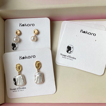 High-end jewelry card custom logo kapok earth paper pearlescent jewelry display packaging card bronzing concave and convex printing