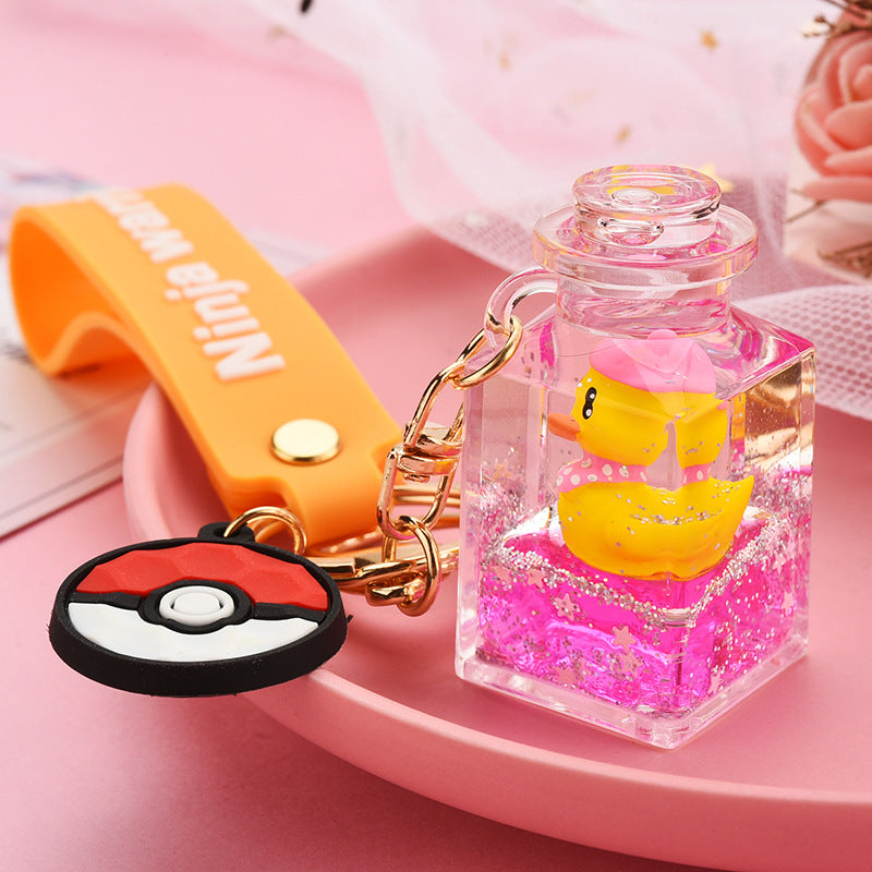 Cute Quicksand Little Yellow Duck Dinosaur Perfume Bottle Acrylic Keychain Wholesale Nihaojewelry