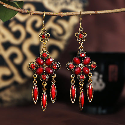 New Retro Ethnic Style Diamond Hollow Long Tassel Alloy Earrings Wholesale