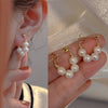 Fashion Heart Shape Flower Copper Beaded Plating Inlay Pearl Zircon Earrings Ear Studs 1 Pair