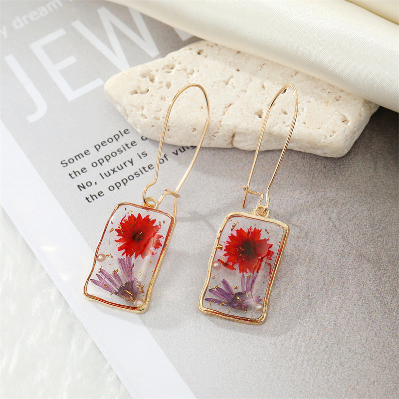 Simple Style Flower Synthetic Resin Alloy Epoxy Transparent Women's Dangling Earrings 1 Pair