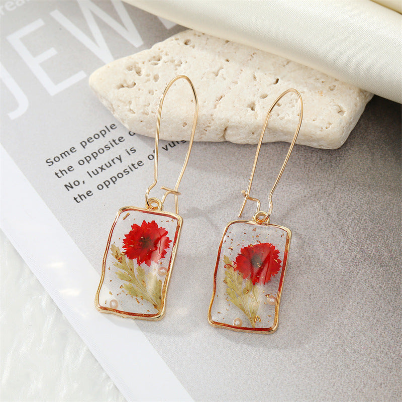 Simple Style Flower Synthetic Resin Alloy Epoxy Transparent Women's Dangling Earrings 1 Pair