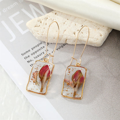 Simple Style Flower Synthetic Resin Alloy Epoxy Transparent Women's Dangling Earrings 1 Pair