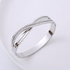 Elegant Lines Stainless Steel Criss Cross Rhinestones Bangle 1 Piece