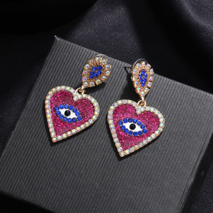 1 Pair Exaggerated Devil's Eye Heart Shape Inlay Alloy Rhinestones Drop Earrings