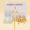 Simple Style Geometric Alloy Resin Inlay Artificial Pearls Rhinestones Women's Hoop Earrings 1 Set