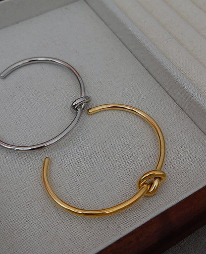 Fashion Solid Color Titanium Steel Plating Knot Bangle