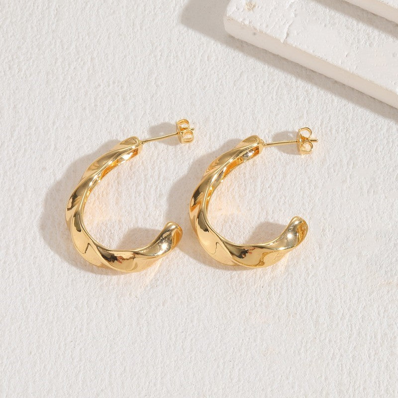 1 Pair Simple Style Classic Style C Shape Heart Shape Twist Plating Copper 14k Gold Plated Earrings