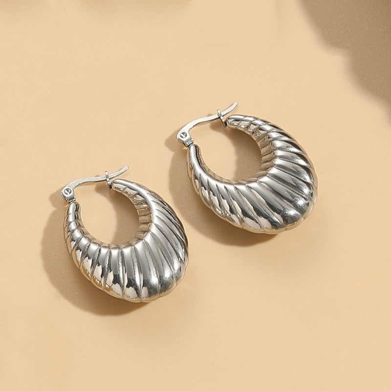 1 Pair Elegant Classic Style Stripe Oval Twist Hollow Out Titanium Steel Earrings