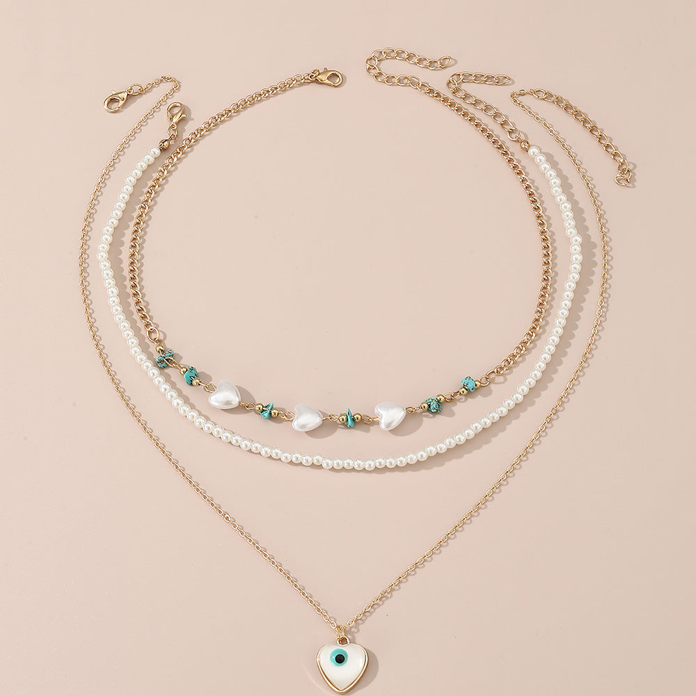 Simple Style Devil's Eye Heart Shape Turquoise Imitation Pearl Alloy Metal Wholesale Necklace