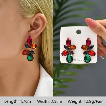 1 Pair Exaggerated Luxurious Shiny Round Heart Shape Wings Plating Inlay Copper Alloy Zinc Alloy Rhinestones Glass Ear Studs