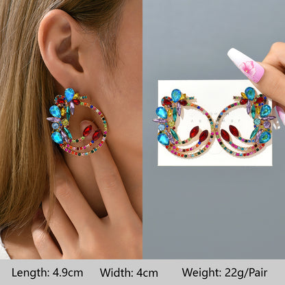 1 Pair Exaggerated Luxurious Shiny Round Heart Shape Wings Plating Inlay Copper Alloy Zinc Alloy Rhinestones Glass Ear Studs