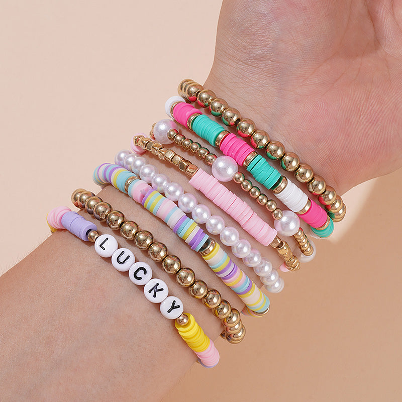 Vacation Multicolor Letter Plaid Gold Plated Imitation Pearl Soft Clay Wholesale Bracelets