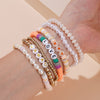 Vacation Multicolor Letter Plaid Gold Plated Imitation Pearl Soft Clay Wholesale Bracelets