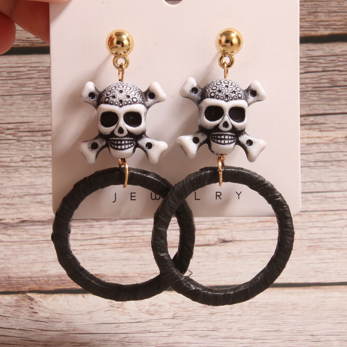 1 Pair Artistic Skull Braid Hollow Out Plastic Raffia Drop Earrings