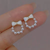 1 Pair Elegant Simple Style Streetwear Flower Bow Knot Plating Inlay Alloy Artificial Pearls Zircon Ear Studs