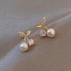 1 Pair Elegant Simple Style Streetwear Flower Bow Knot Plating Inlay Alloy Artificial Pearls Zircon Ear Studs