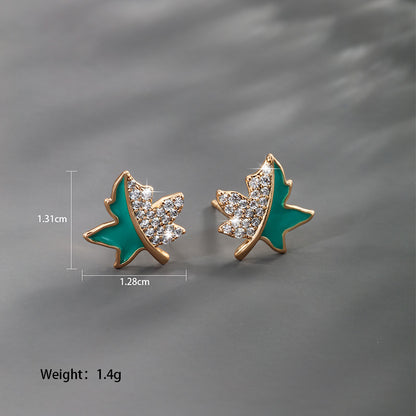 1 Pair Xuping Simple Style Classic Style Maple Leaf Heart Shape Flower Plating Inlay Copper Alloy Artificial Gemstones 14k Gold Plated 18k Gold Plated Ear Studs