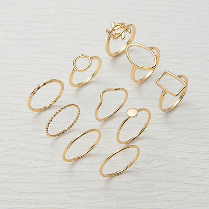 Ig Style Elegant Geometric Alloy Stone Plating Inlay Artificial Gemstones Gold Plated Women's Rings