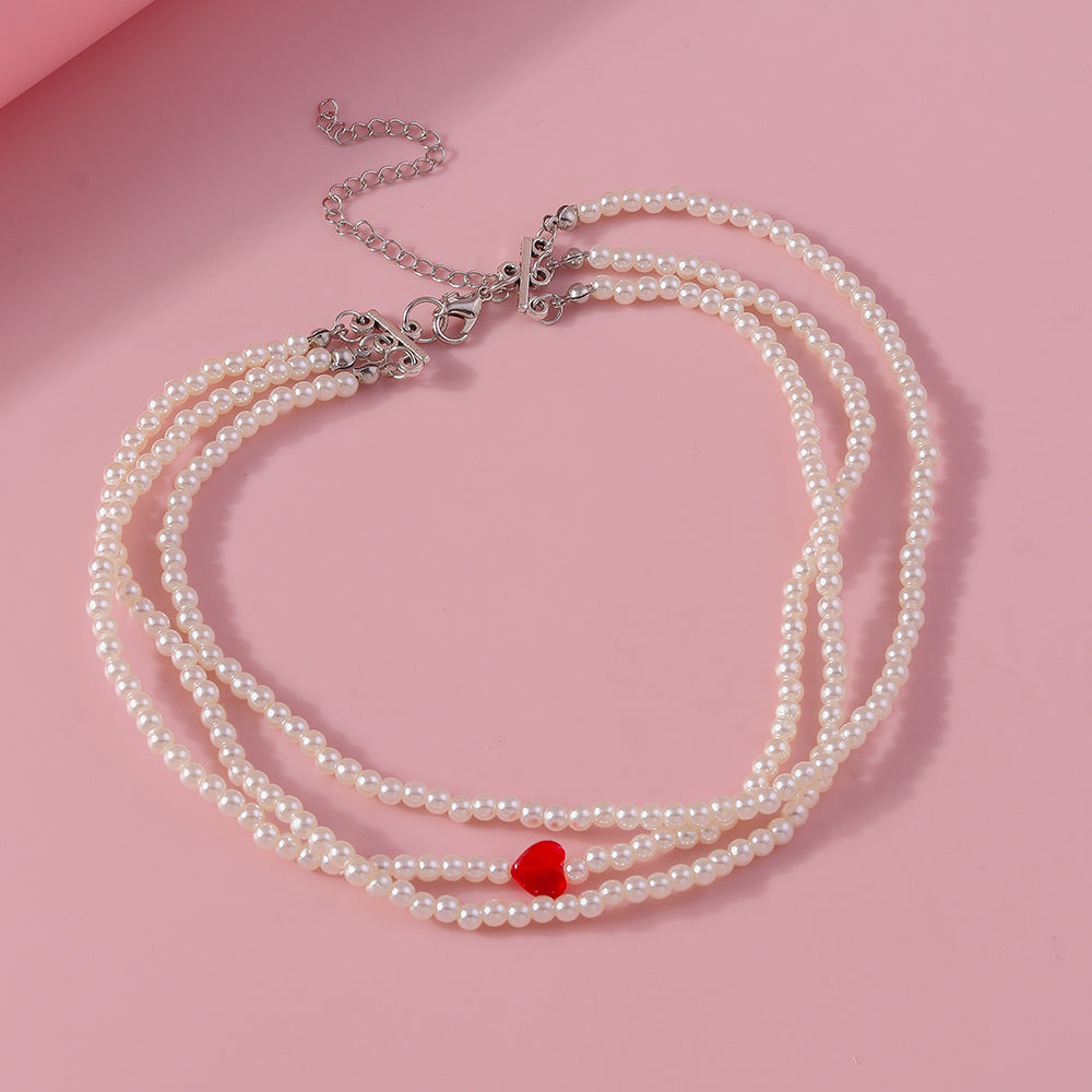 Simple Style Classic Style Heart Shape Artificial Pearl Zinc Alloy Beaded Women's Layered Necklaces