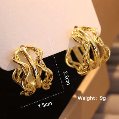 1 Pair Ig Style Glam Exaggerated Irregular Solid Color Spiral Plating Hollow Out Metal Copper 18k Gold Plated Drop Earrings Ear Studs