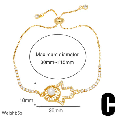 Simple Style Heart Shape Eye Copper Plating Inlay Artificial Pearls Zircon 18k Gold Plated Bracelets