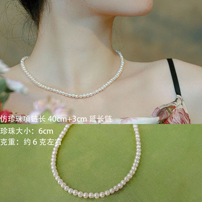 Simple Style Round Imitation Pearl Beaded Inlay Rhinestones Women's Long Necklace