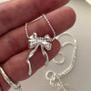 Sterling Silver Simple Style Bow Knot Plating Pendant Necklace