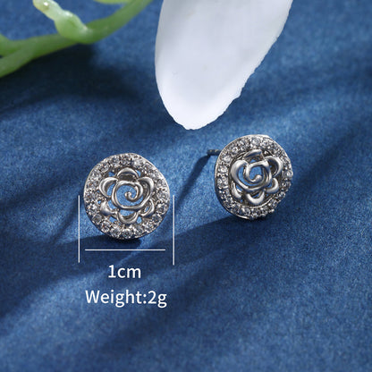 1 Pair XUPING Sweet Shiny Round Flower Hollow Out Inlay Alloy Copper Alloy Artificial Gemstones White Gold Plated Ear Studs