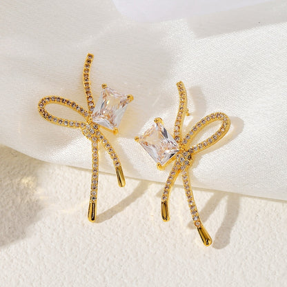 1 Pair Simple Style Classic Style Asymmetrical Bow Knot Plating Inlay Copper Zircon 18K Gold Plated Drop Earrings